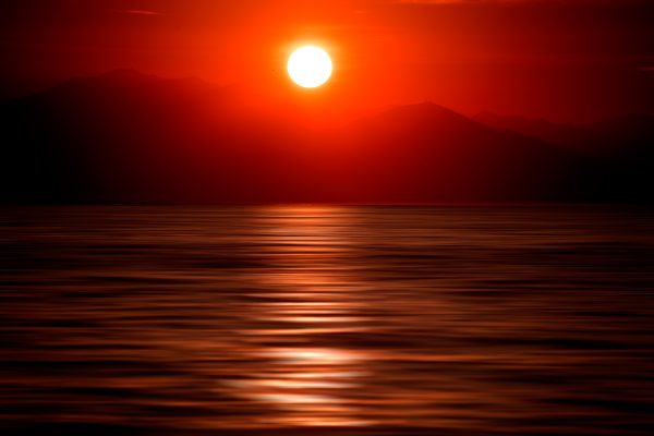 Red Sun Rise and Mountains Poster